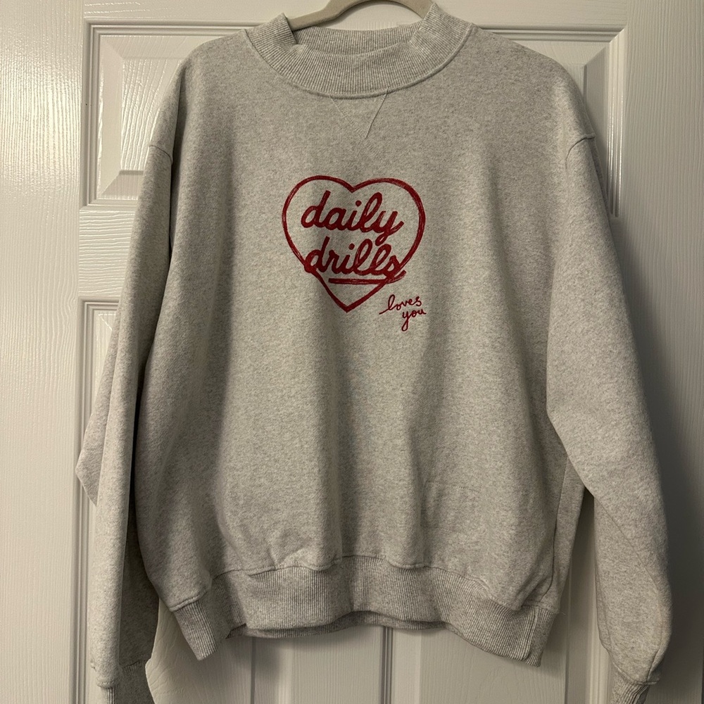 Daily Drills Gray Sweatshirt with Red Heart Accent